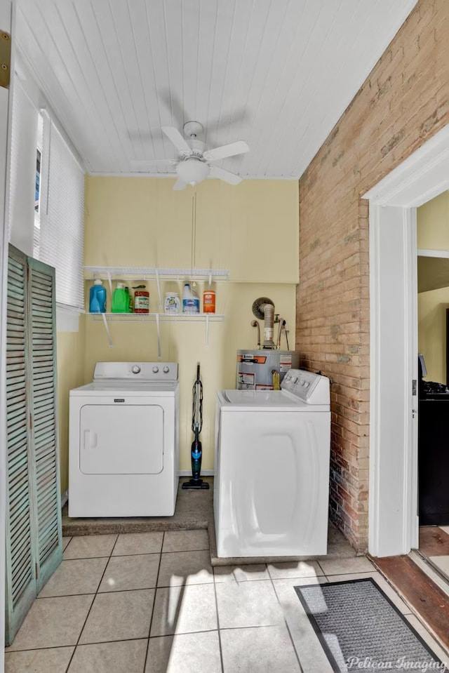 laundry area featuring wood ceiling, ceiling fan, washer and clothes dryer, and light tile patterned floors