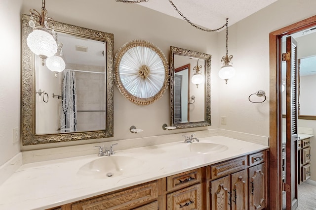 bathroom featuring curtained shower, visible vents, a sink, and double vanity