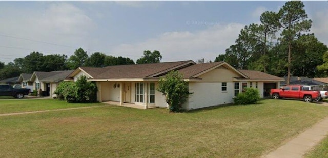 ranch-style house with a front yard