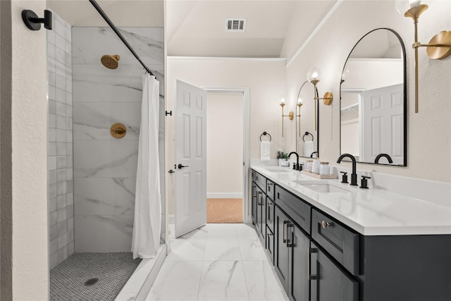 bathroom featuring vanity and a shower with shower curtain