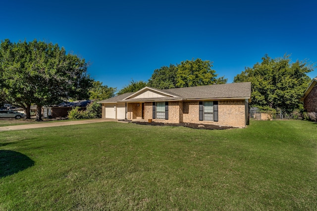 ranch-style house with a garage and a front lawn