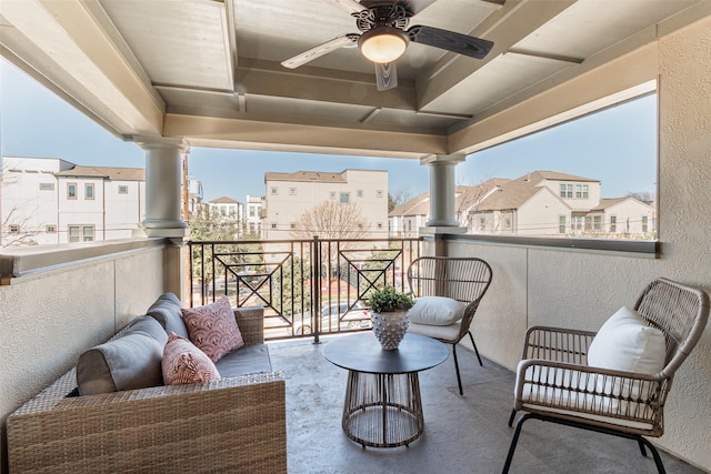 balcony with outdoor lounge area and ceiling fan