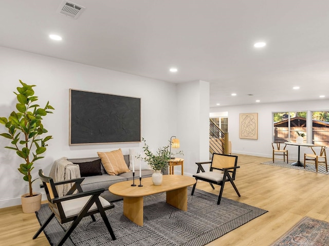 living room featuring light wood-type flooring