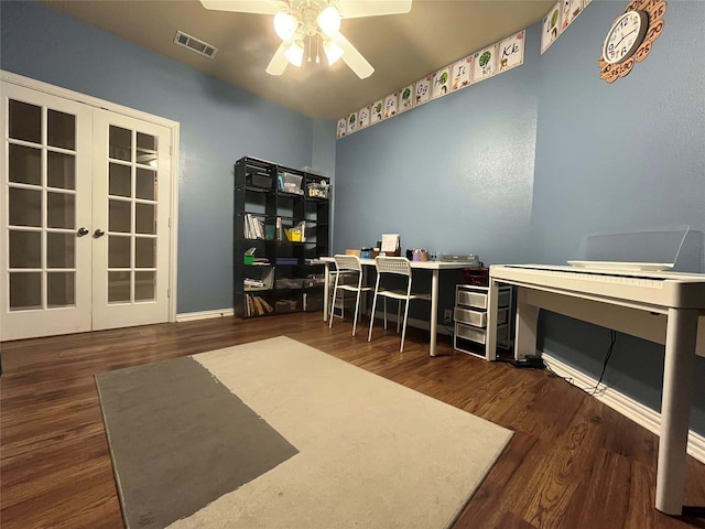 home office featuring dark hardwood / wood-style floors, french doors, and ceiling fan