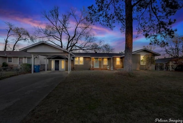 single story home with a carport