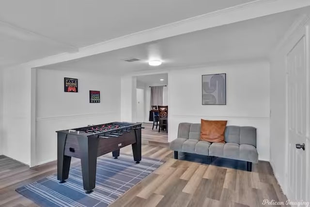 playroom with hardwood / wood-style floors