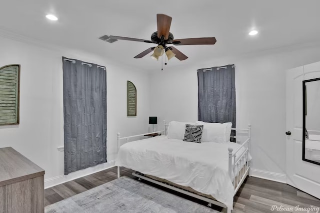 bedroom featuring dark hardwood / wood-style floors and ceiling fan