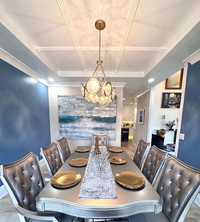 dining space featuring coffered ceiling and a notable chandelier