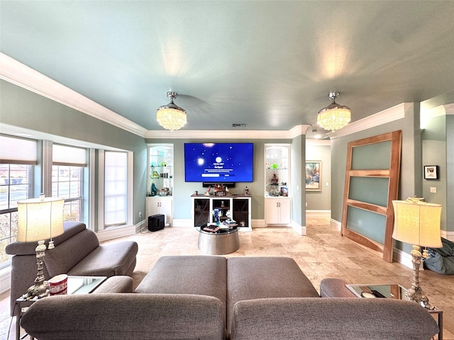 living room featuring a notable chandelier and crown molding