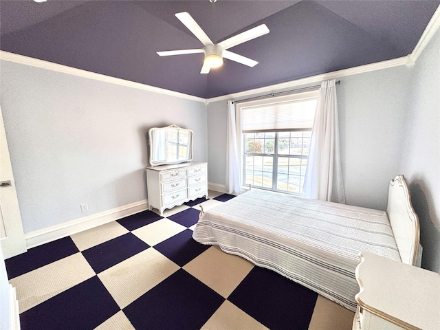 bedroom with ceiling fan and ornamental molding