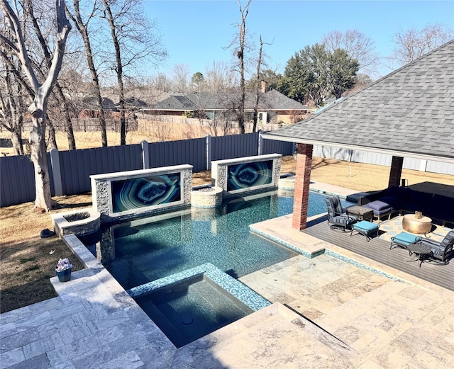 view of pool with a jacuzzi