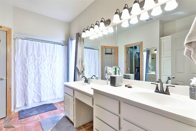 bathroom featuring vanity and tile patterned floors