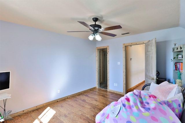 bedroom featuring wood-type flooring and ceiling fan