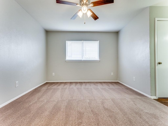 unfurnished room with carpet floors and ceiling fan