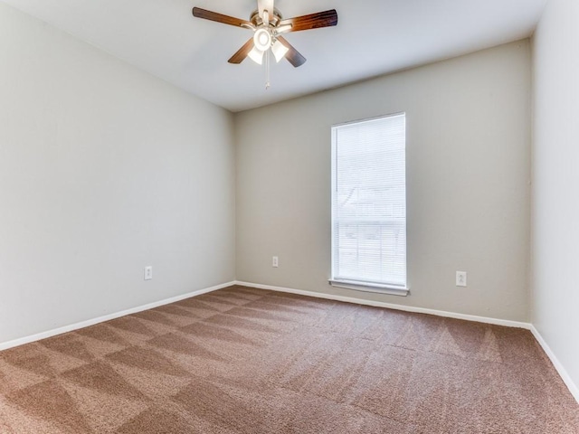 unfurnished room with carpet floors and ceiling fan