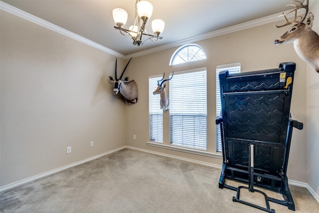 exercise room with crown molding, carpet floors, and a chandelier