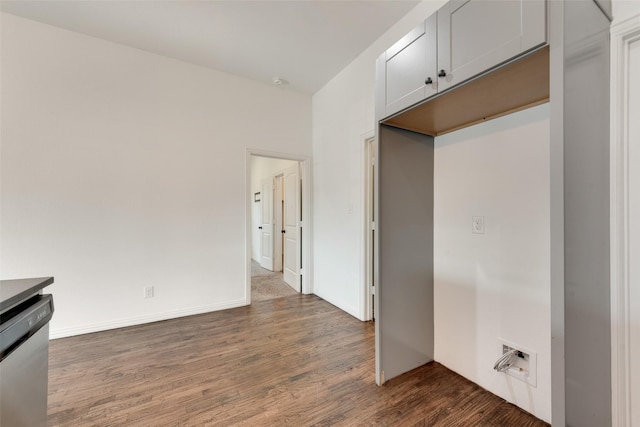 interior space featuring dark hardwood / wood-style flooring and stainless steel dishwasher