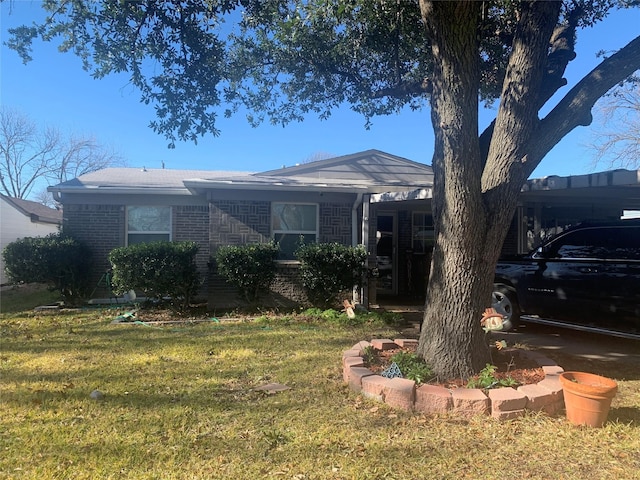 view of front of home with a front yard