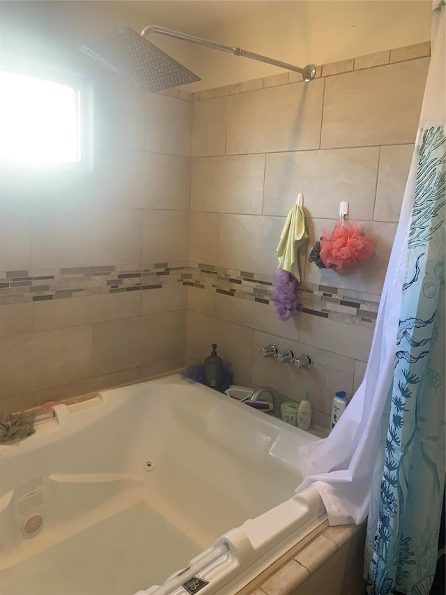 bathroom with shower / tub combo with curtain