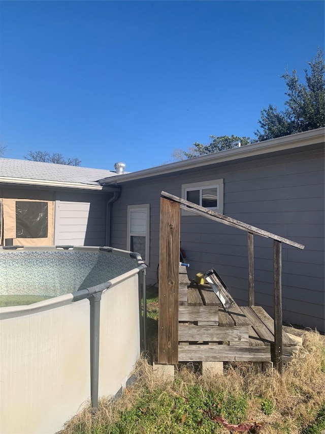 property entrance with a wooden deck