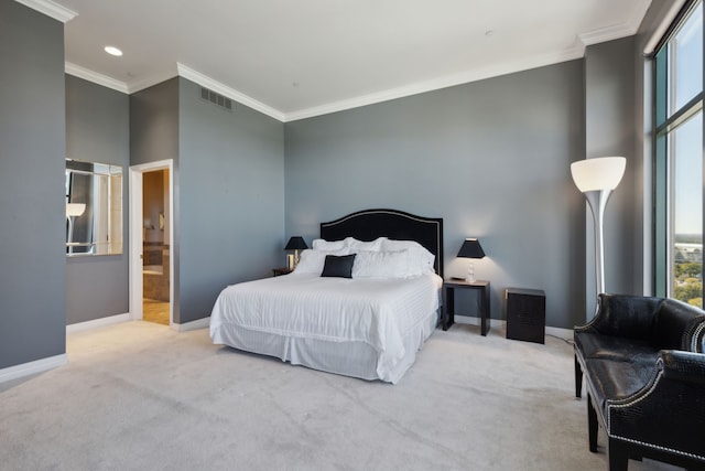 bedroom featuring crown molding, light colored carpet, and multiple windows