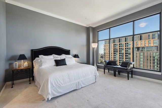 bedroom featuring light carpet and ornamental molding