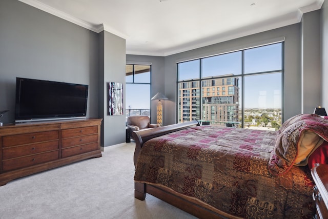 bedroom featuring ornamental molding and light colored carpet