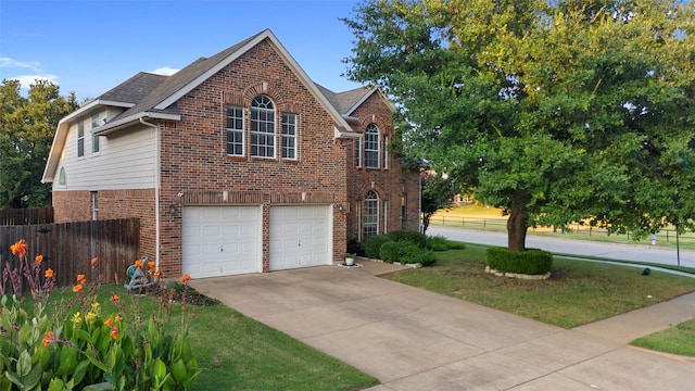 view of front of property with a garage