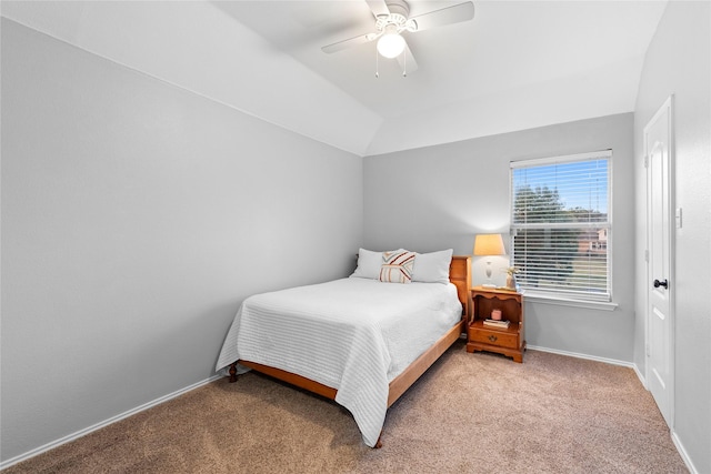 carpeted bedroom with lofted ceiling and ceiling fan