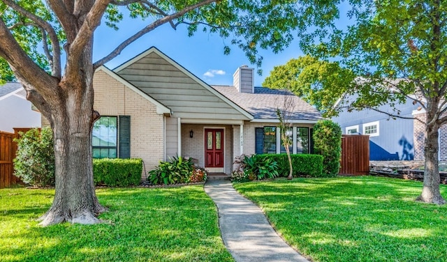 view of front of home with a front lawn