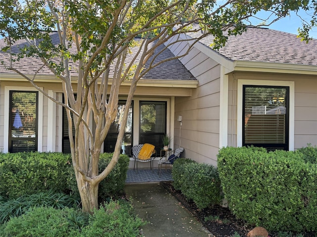 doorway to property with a patio area