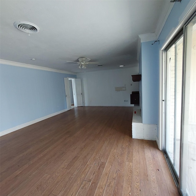 unfurnished room with ornamental molding, plenty of natural light, ceiling fan, and light hardwood / wood-style flooring