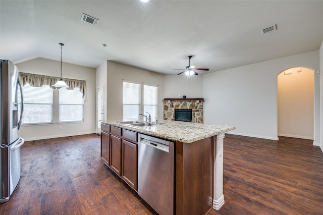 kitchen featuring a sink, a ceiling fan, visible vents, and stainless steel appliances