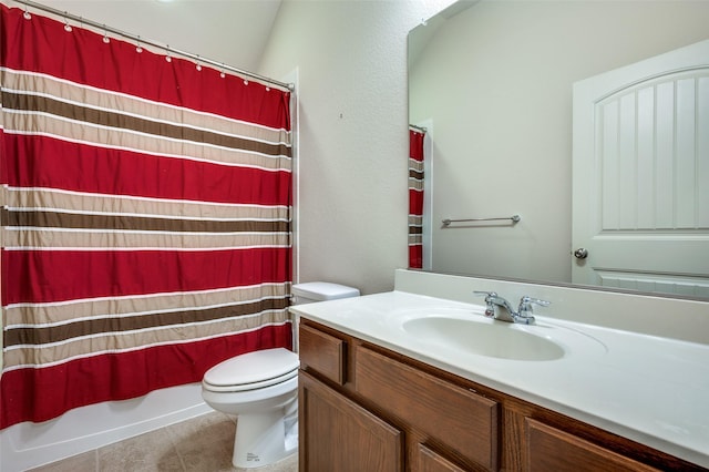 full bath with tile patterned floors, shower / bath combo with shower curtain, toilet, and vanity