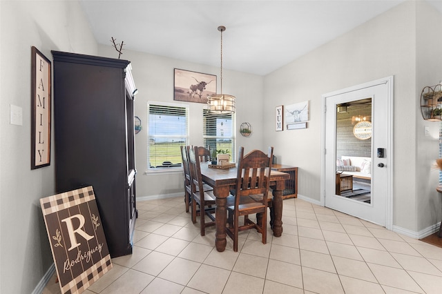 dining area with light tile patterned floors