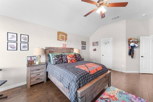 bedroom featuring lofted ceiling, dark wood-type flooring, and ceiling fan