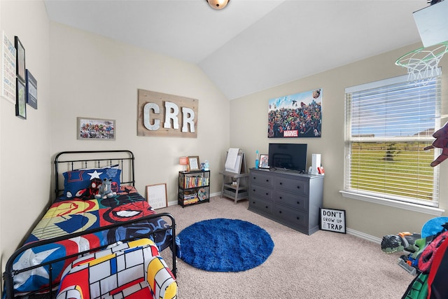 carpeted bedroom with vaulted ceiling