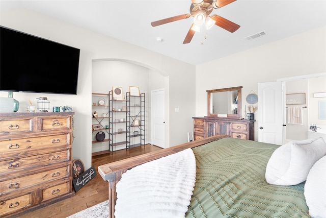 bedroom with hardwood / wood-style flooring and ceiling fan