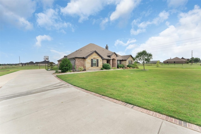 view of front facade with a front yard