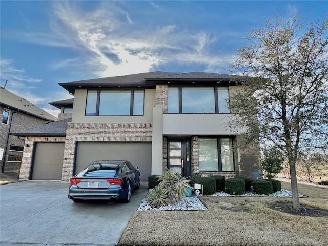 view of front of property featuring a garage