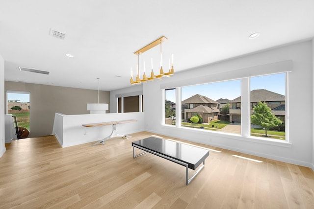 5399 Randwick Trl, Frisco, TX 75036 - unfurnished living room with wood finished floors, baseboards, and recessed lighting