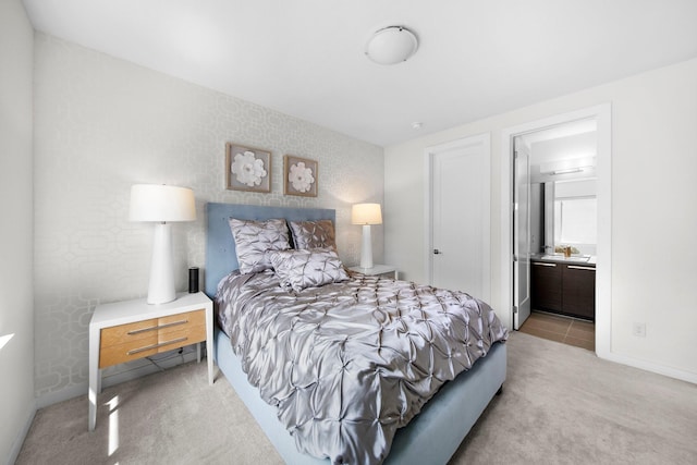 5399 Randwick Trl, Frisco, TX 75036 - carpeted bedroom with a sink and ensuite bathroom