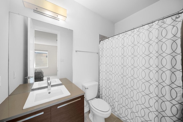 5399 Randwick Trl, Frisco, TX 75036 - bathroom with toilet, vanity, and curtained shower