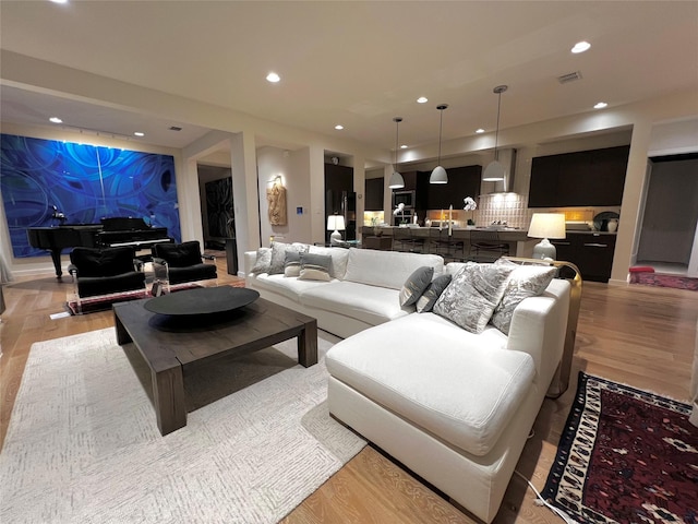 living room featuring light hardwood / wood-style flooring