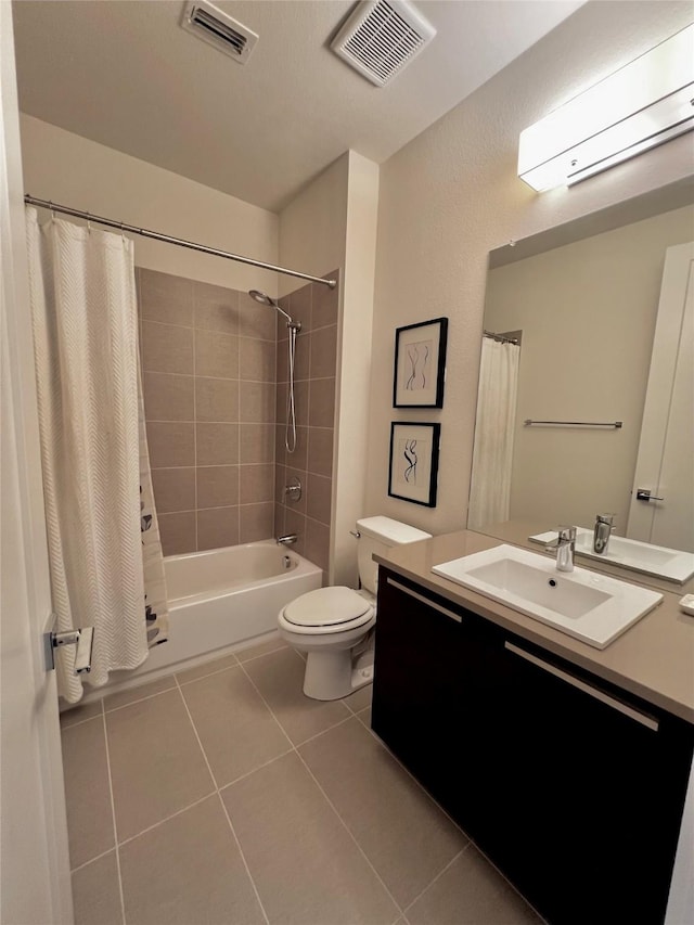 full bathroom with an AC wall unit, tile patterned flooring, vanity, shower / tub combo, and toilet