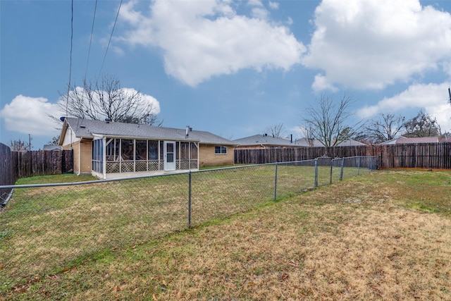 view of yard featuring a sunroom