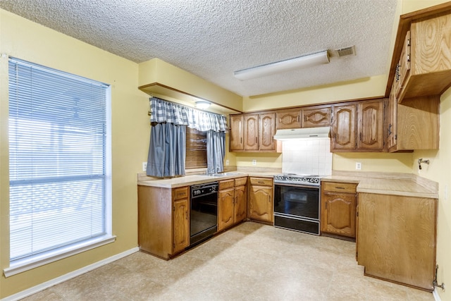 kitchen with sink, range with electric stovetop, a textured ceiling, and dishwasher