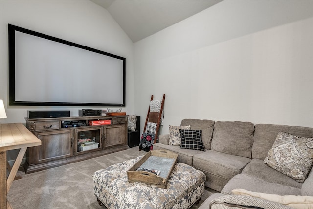 carpeted cinema featuring lofted ceiling