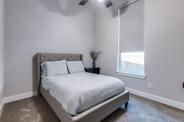 bedroom with carpet floors, ceiling fan, and baseboards