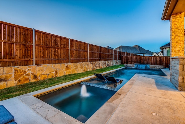 view of swimming pool featuring a fenced backyard, a fenced in pool, and a patio